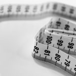 selective focus photography of tape measure